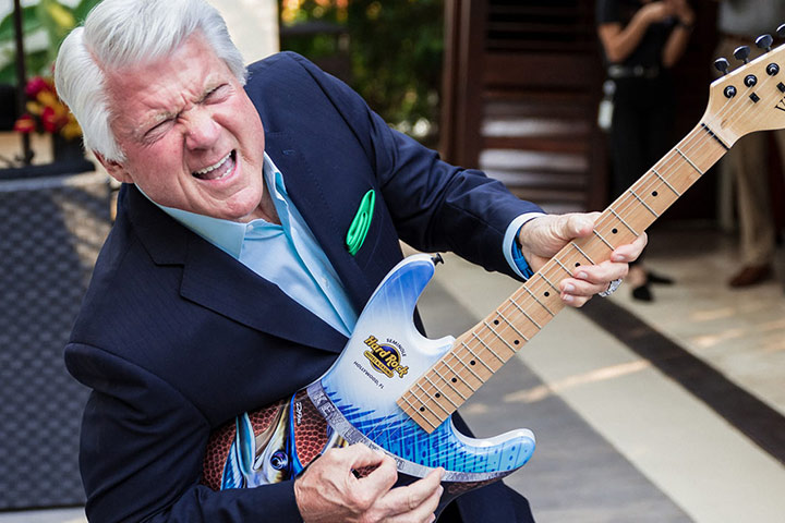 Jimmy Johnson playing a Hard Rock guitar
